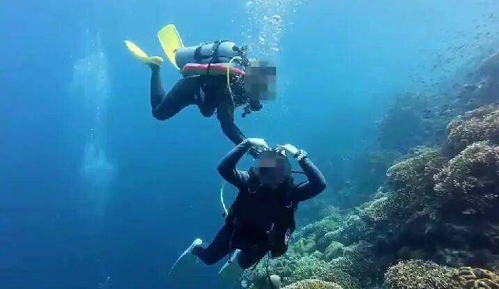 潜水员水下关闭女性潜友气瓶，疑还拍视频发朋友圈？多方回应